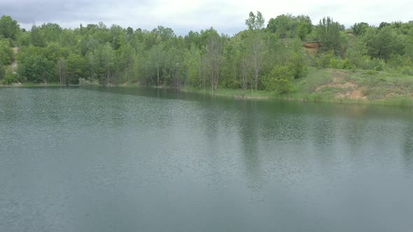 Spring morning scenery on the lake 4K aerial video