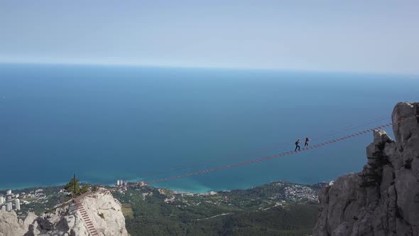 A Top View of the Highest Mountain in Crimea - Ai-Petri and Several Tourists Climbing a Hike Over an