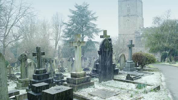 Churchyard Landscape In Heavy Snowfall