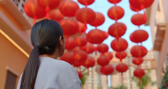 Woman look at the red lantern