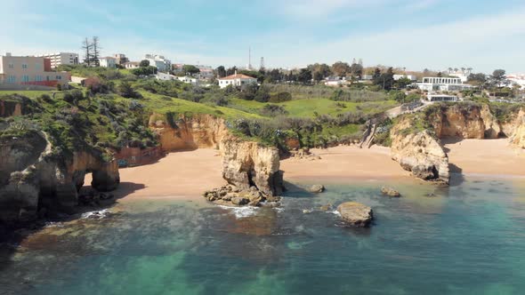 Algarve, luxury houses overlooking Lagos sea and sand beach. Real Estate concept