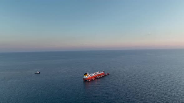 A gas tanker is anchored at sea aerial view 4 K