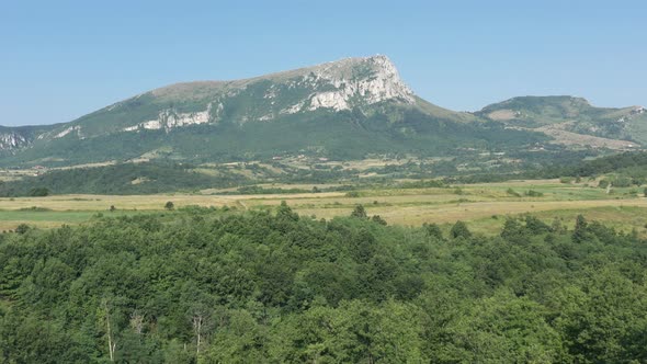 Slow tranquil flight over the Stol mountain valley 4K aerial footage