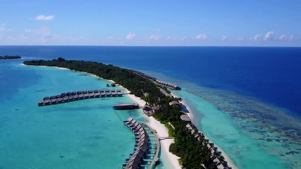 Aerial view panorama of exotic lagoon beach by blue ocean with sand background