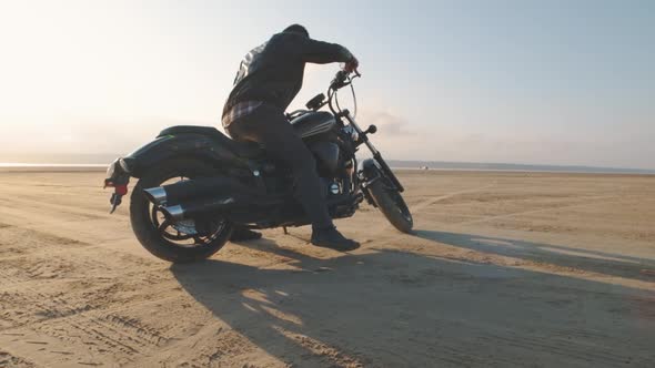 Motorcyclist Doing Tire Burnout in the Desert Slow Motion