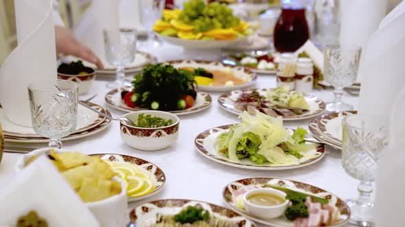Serving a Large Banquet Table in a Restaurant or at Home for a Holiday
