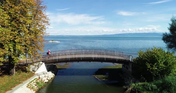 Aerial view of people cycling along Constance Lake, Switzerland.