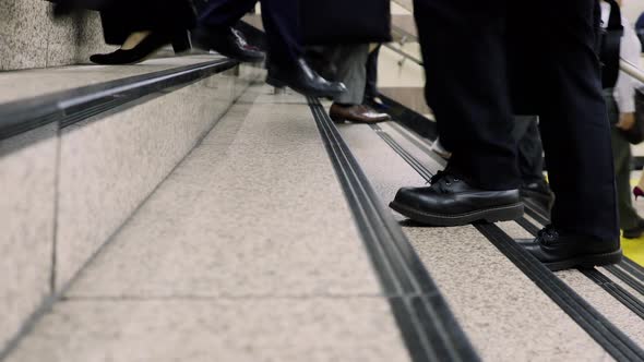 Low Angle Japanese Commuters Walking