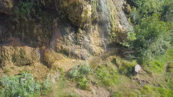 I spent the day by the river. I showered under the waterfall. I crossed the river across the river.