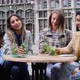 Attractive Young Women of Mixed Race Partying Outside in the City Drinking Cocktails and Smiling and - VideoHive Item for Sale