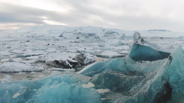 Aerial View of the J Kuls Rl n Glacial Lagoon and Floating Icebergs. The Beginning of Spring in