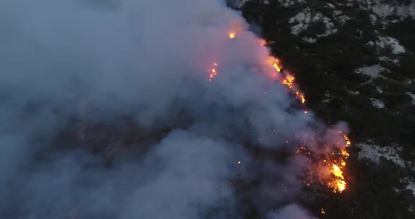 Aerial Panoramic View of a Forest Fire at Night Heavy Smoke Causes Air Pollution and Fire in Full