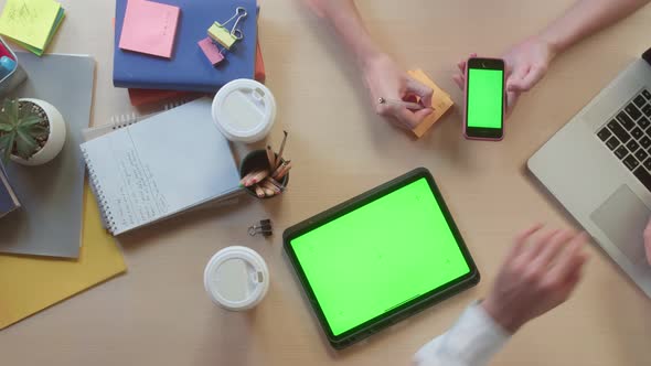 Business People Using Gadgets with Chroma Green Screen Top View