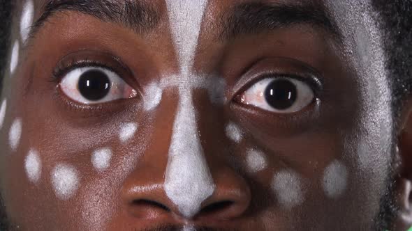 Face of an African American Man with an Ethnic White Pattern