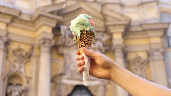 Italian Ice-Cream Cone Held In Hand. Holiday In Rome , Italy.