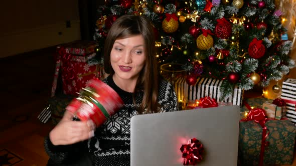 Young Asian Woman Videocalling in Christmas Eve