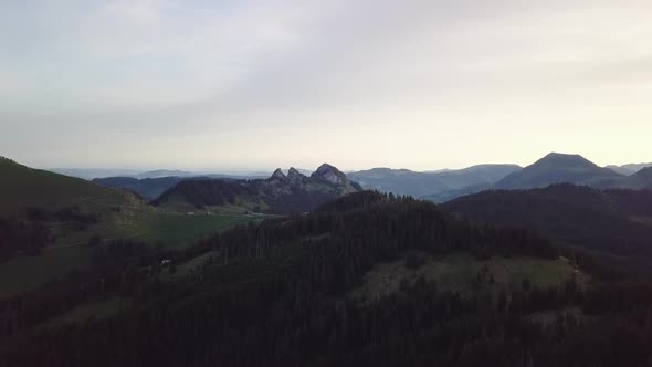 A slow flight while sunrise in the swiss alps