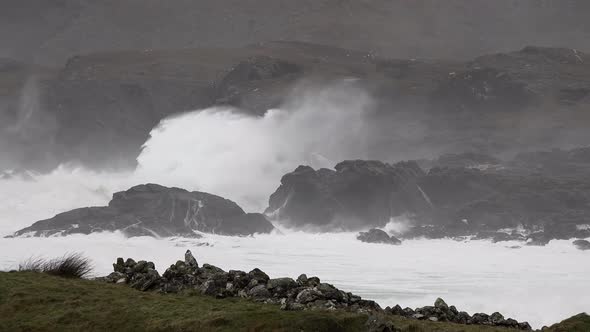 Huge Waves Crashing Into the Rocks of Glen Bay By Glencolumbkille in County Donegal  Ireland