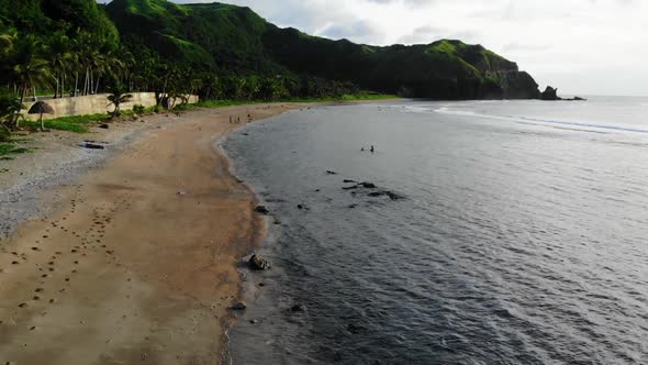 Slow reveal of an island beach shore in Batanes, Philippines