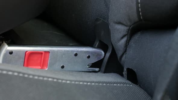 Locking booster seat in car brackets slow-mo video