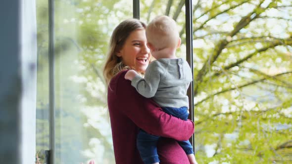 Mother playing with her baby 4k