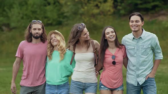 Happy Friends Having Fun Outdoors In Nature.