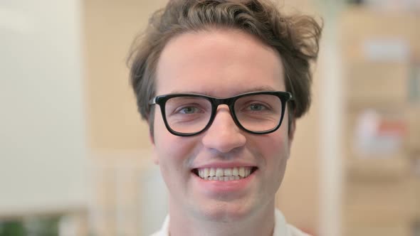 Face Close Up of Smiling Young Man