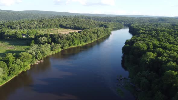 aerial view overlooking river and trees