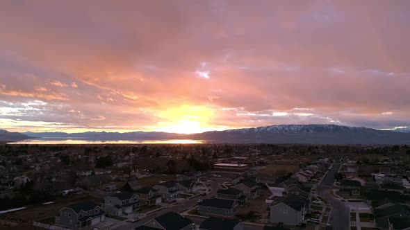 Aerial view of colorful sunset moving downwards