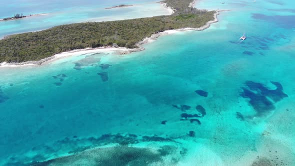 Aerial drone footage of the beautiful Pearl Island in the Bahamas near Nassau, showing the beach