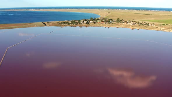 Beautiful top view of the salty, pink lake. Beautiful pink sunset.