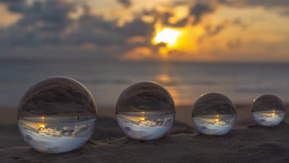 Time Lapse Four Crystals Balls In Beautiful Sunset On The Beach