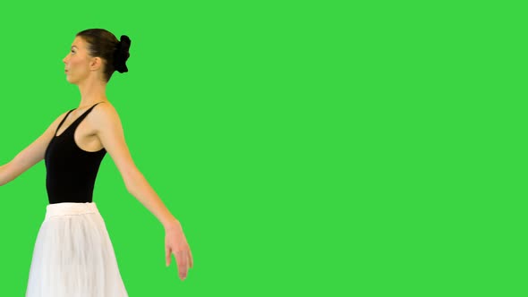 Young Ballerina Walks Demi Pointe on a Green Screen Chroma Key