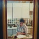 Inspired Woman Author Writes a Novel at Home Sitting at the Table in the Evening - VideoHive Item for Sale