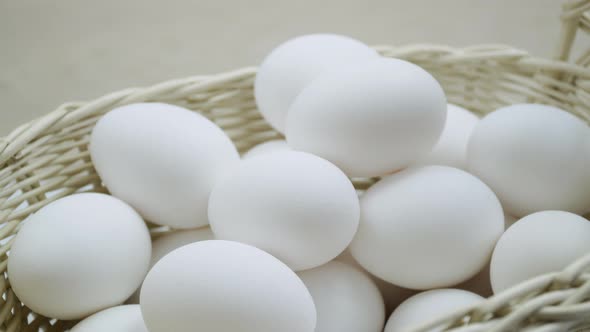 Raw Eggs in a Rotating Basket