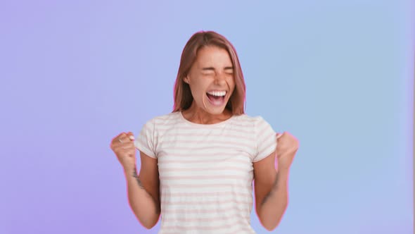 Female with Pink Hair Dressed in Striped Tshirt