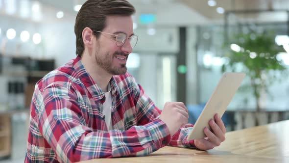 Professional Male Designer Doing Video Call on Tablet