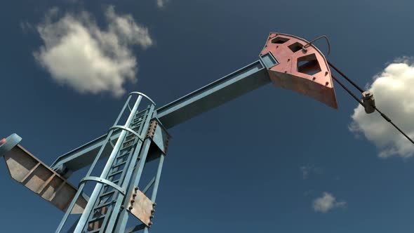 Low Angle View of Oil Pump Jack Working and Pumping Crude Oil under Blue Sky alt