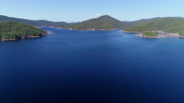 Wide Aerial Shot of large lake or reservoir