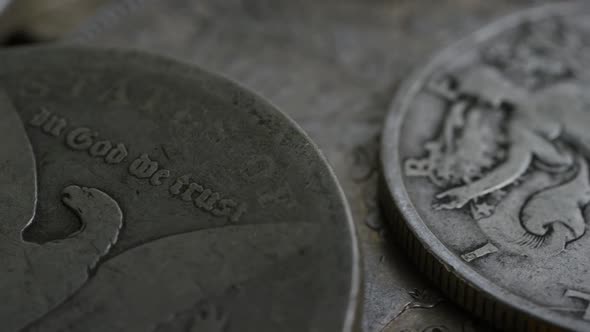 Rotating stock footage shot of antique American coins - MONEY 0096