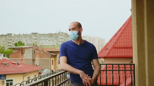 Man with Protection Mask Feeling Down