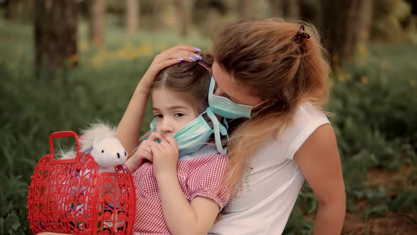 Little Young Girl Kid Parent On Self-isolation Quarantine, Coronavirus. Sad Children In Face Mask.