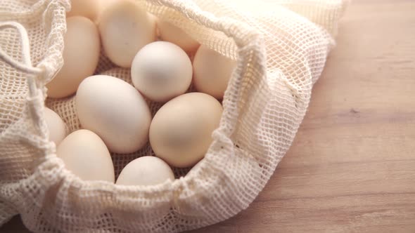 Close Up of Eggs in a Reusable Shopping Bag on Table