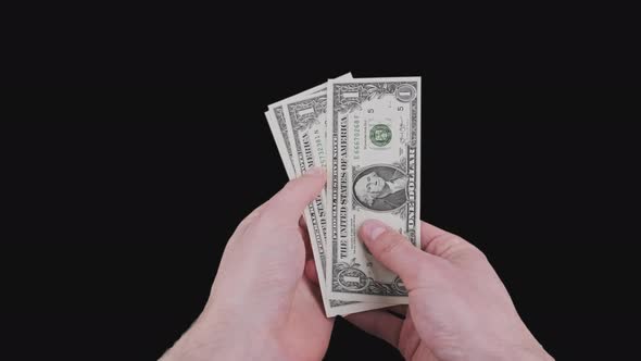 Male Hands Show Several One Dollar Bills with Alpha Channel