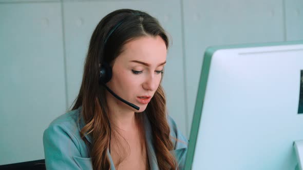 Business People Wearing Headset Working in Office