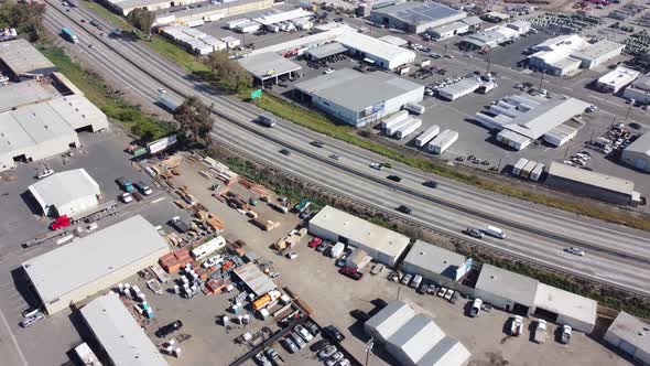Aerial Drone California Freeway in Urban Industrial Area 4k