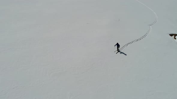 Skier Walking Snow