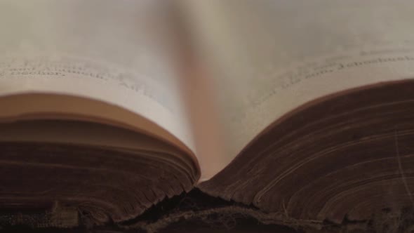Turning pages of an old book