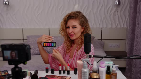 Curly Girl Blogger Records a Video About Skin Care Cosmetics in Her Bedroom