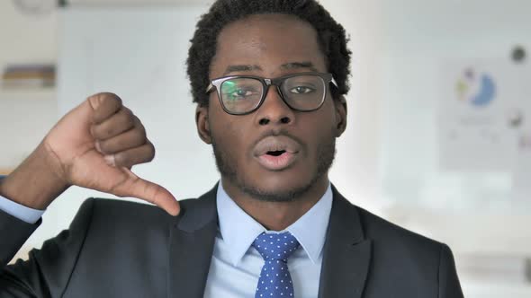 Thumbs Down By African Businessman
